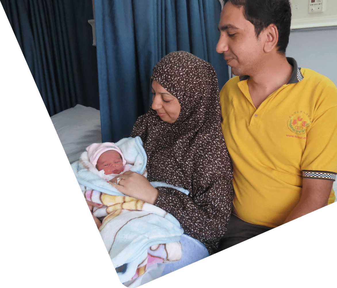 Mother, father and baby in hospital